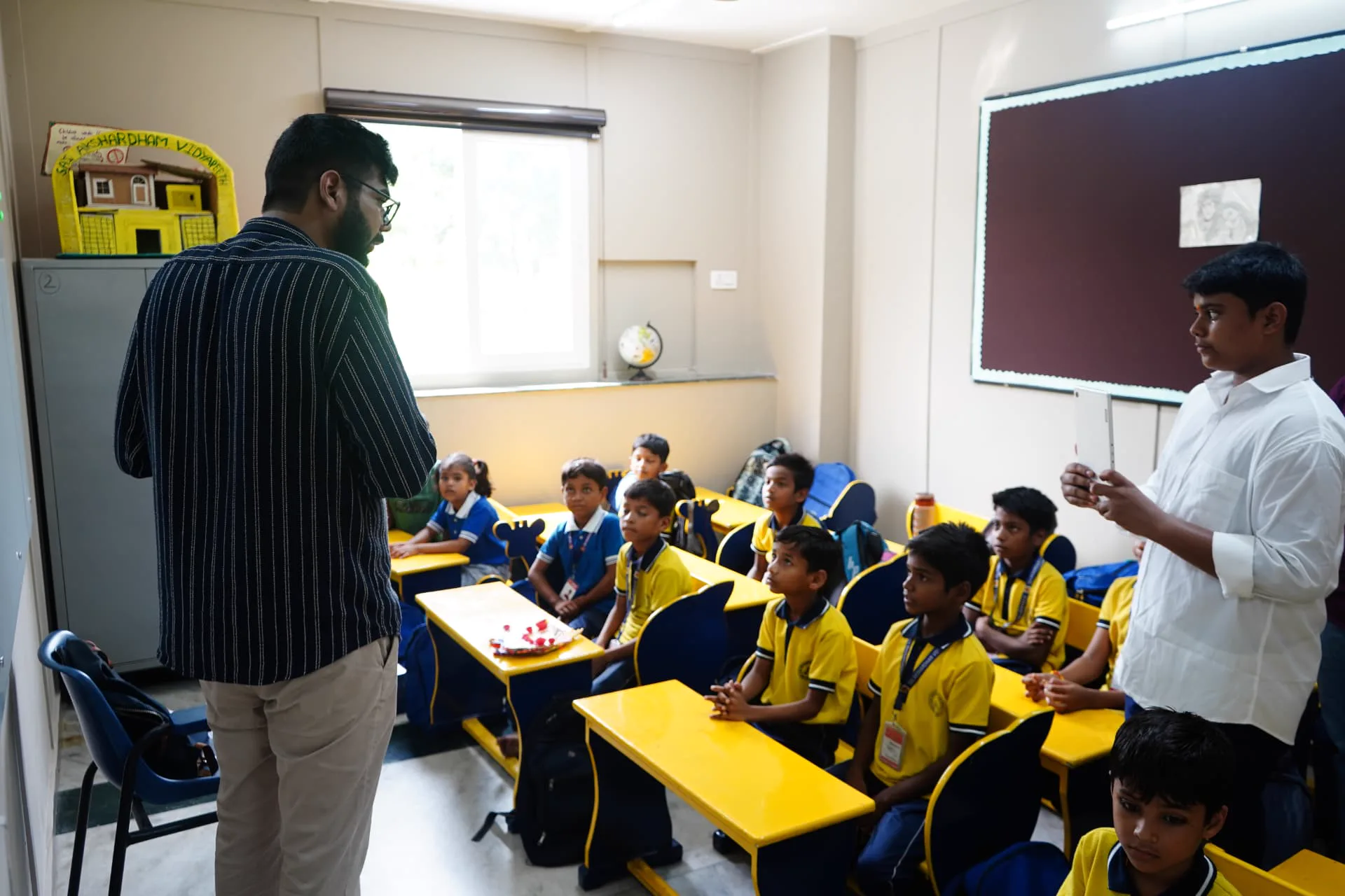 A student presenting an idea to classmates